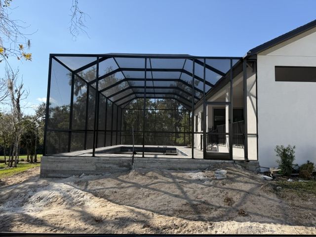 Pool cage under construction
