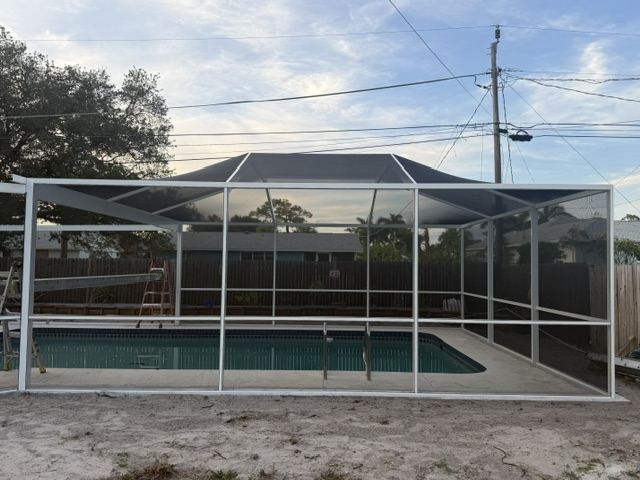 White pool cage build