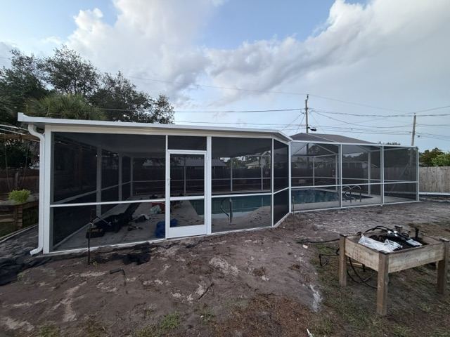 Completed white pool enclosure